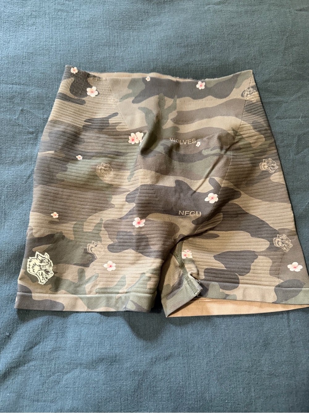 Darc Sport Women's Camouflage Bike Shorts with Pink Floral Accents